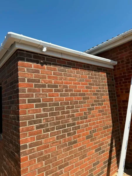 Corner of a brick extension showing the finished external brickwork
