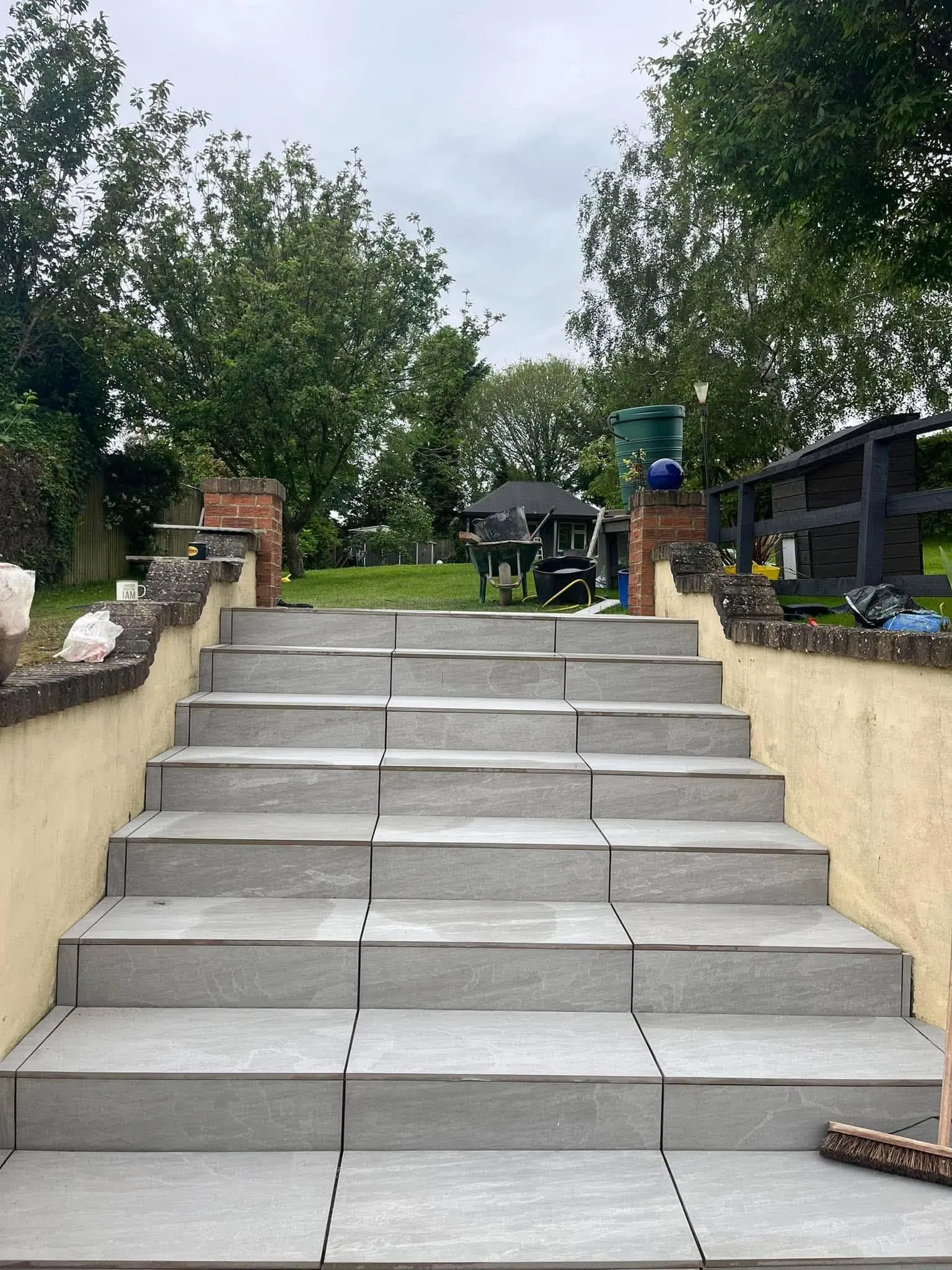 Grey porcelain garden steps viewed from the bottom after completion